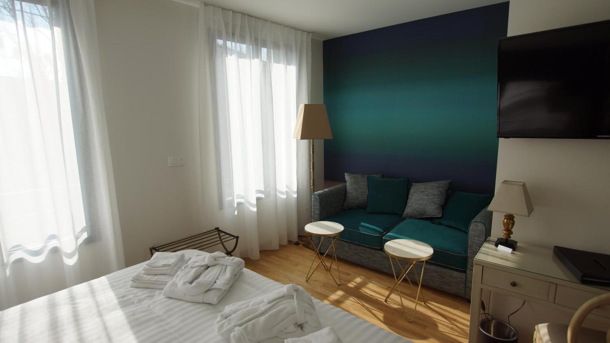 Hotel De Charme L'Oree Du Parc โรม็อง-ซูร์-อีแซร์ ภายนอก รูปภาพ